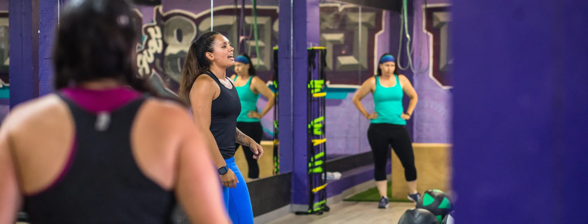 Alyssa Charbonneau teaching a class at Liber8Fit