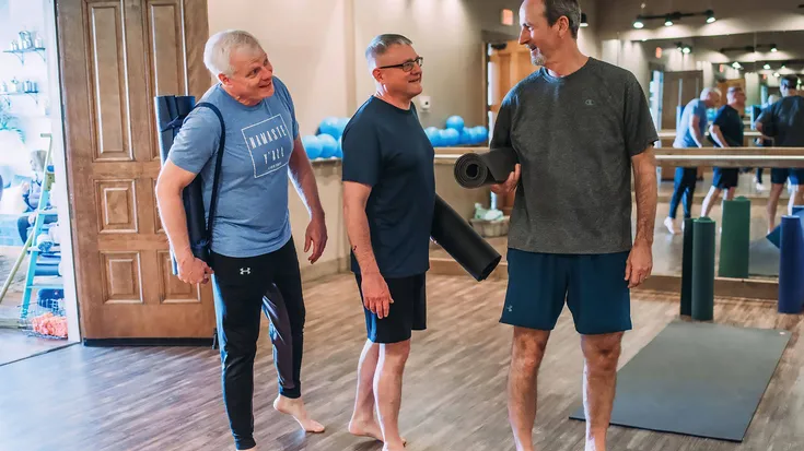 Men lining up for class at Studio South